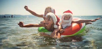 Image of children floating at the beach